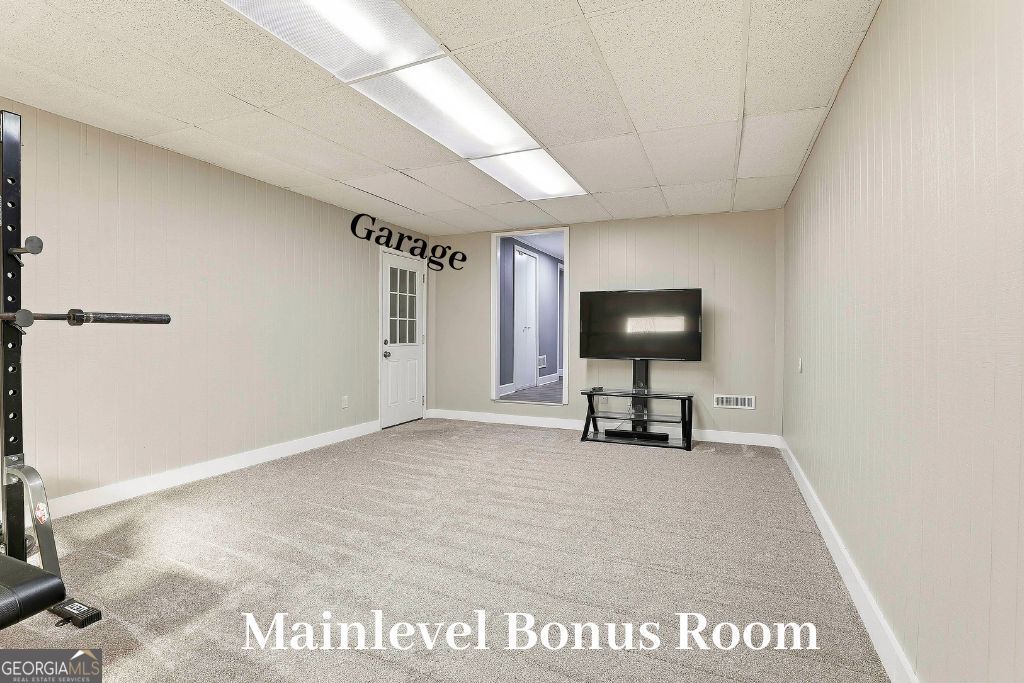 180 Lockwood Road Fayetteville, GA 30215 - Photo 25 of 59 a view of livingroom with table and chair