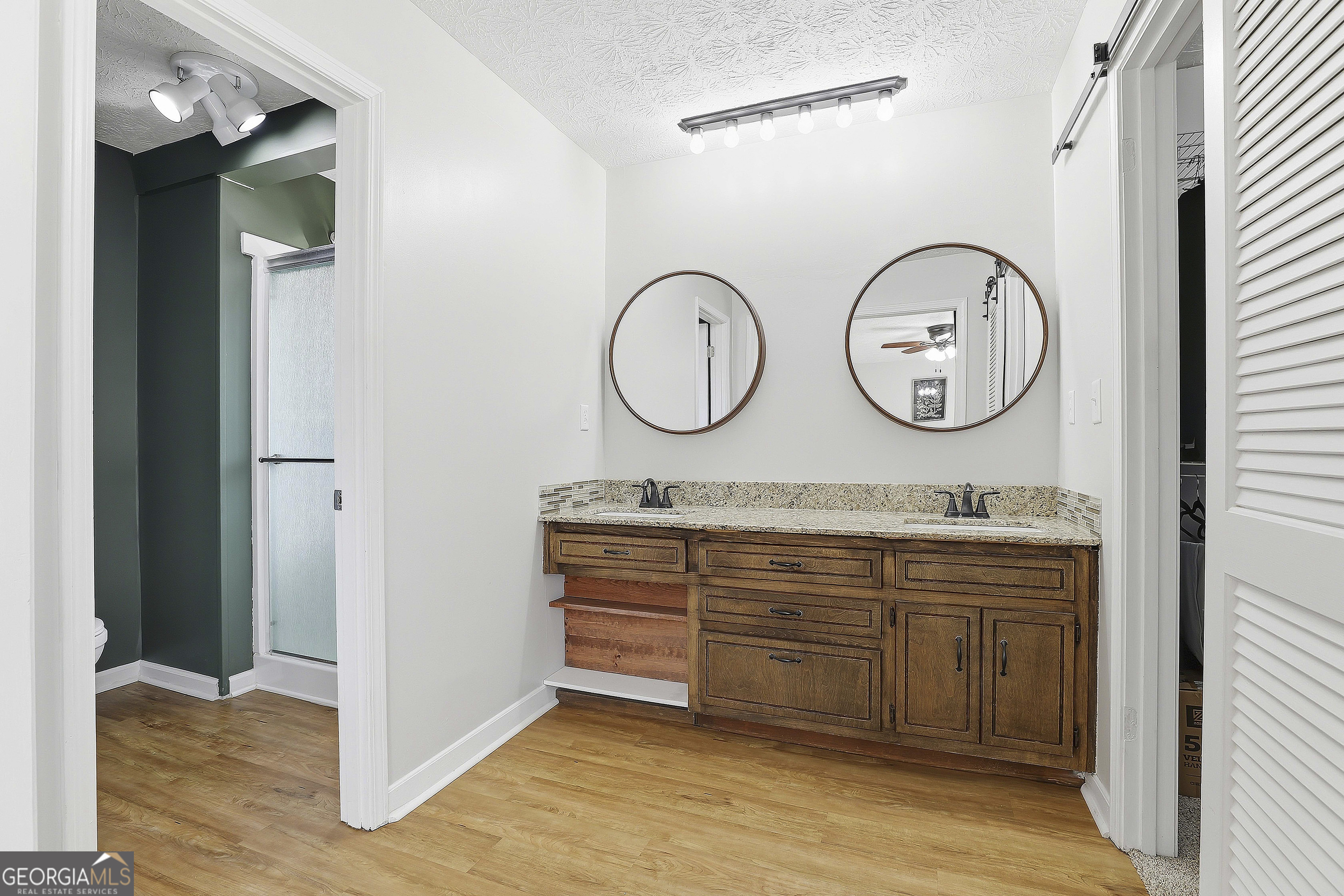 180 Lockwood Road Fayetteville, GA 30215 - Photo 32 of 59 a area with wooden floor and a wooden floor