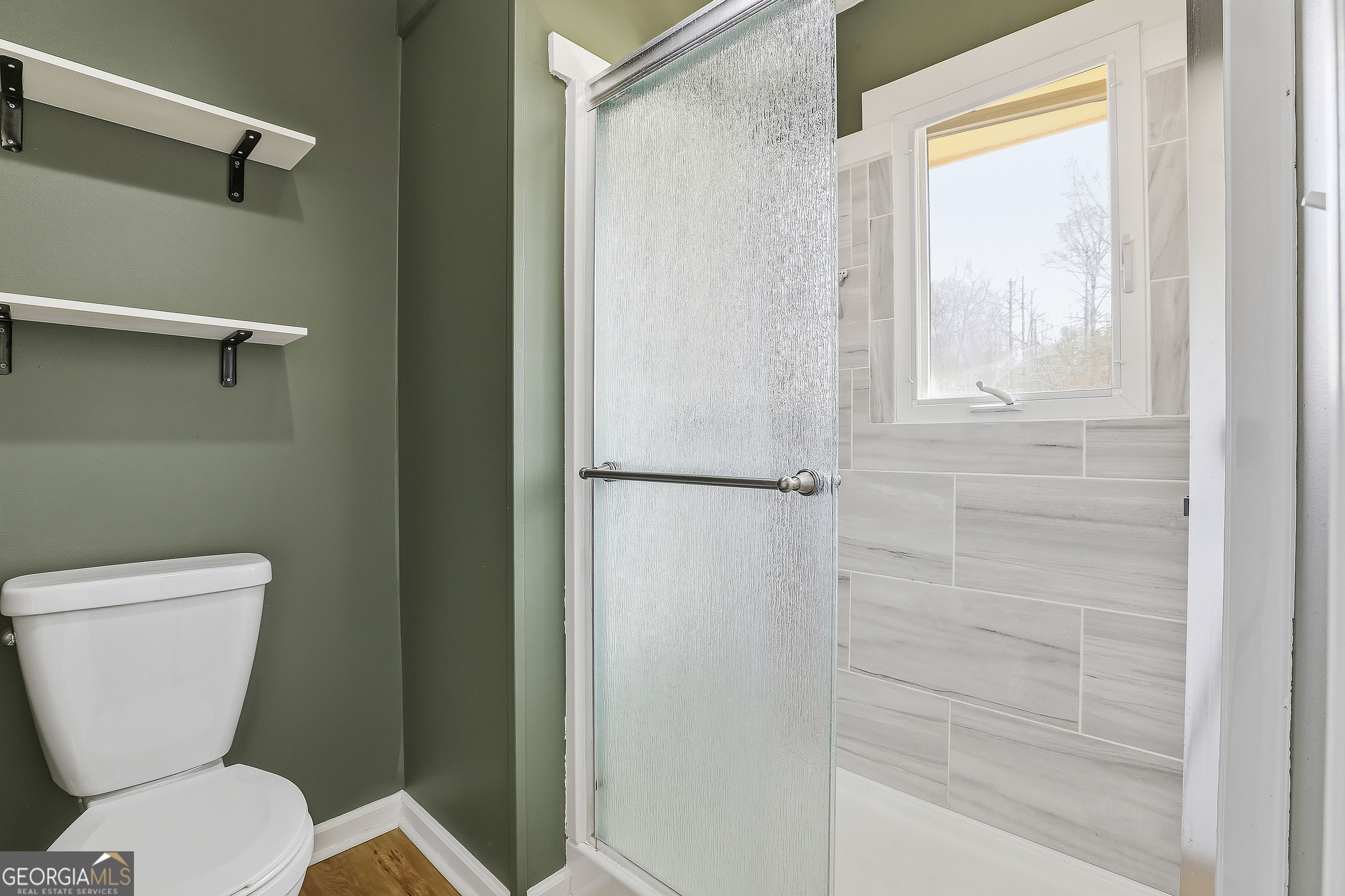 180 Lockwood Road Fayetteville, GA 30215 - Photo 33 of 59 a bathroom with a toilet