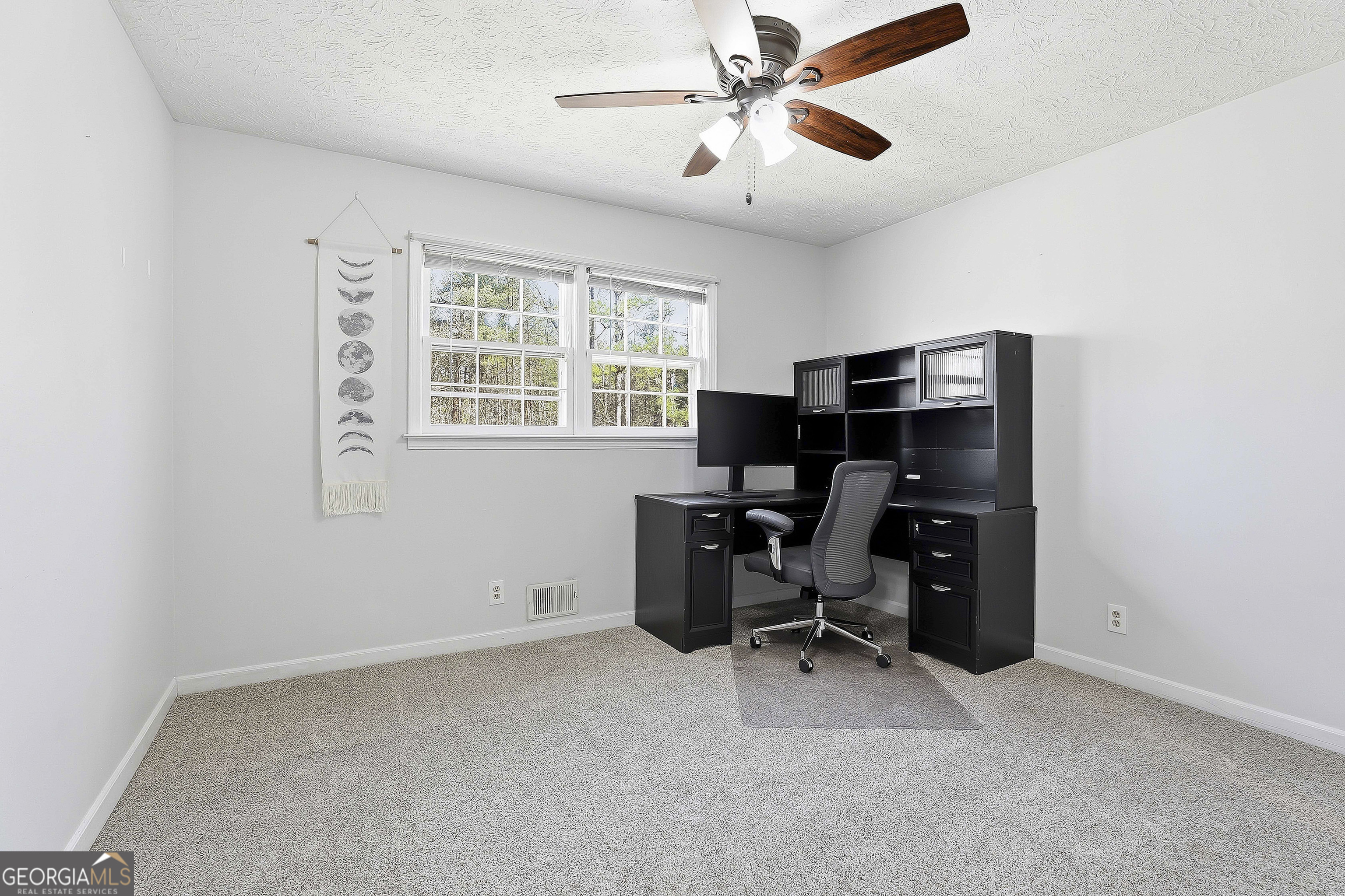 180 Lockwood Road Fayetteville, GA 30215 - Photo 39 of 59 a view of workspace with windows