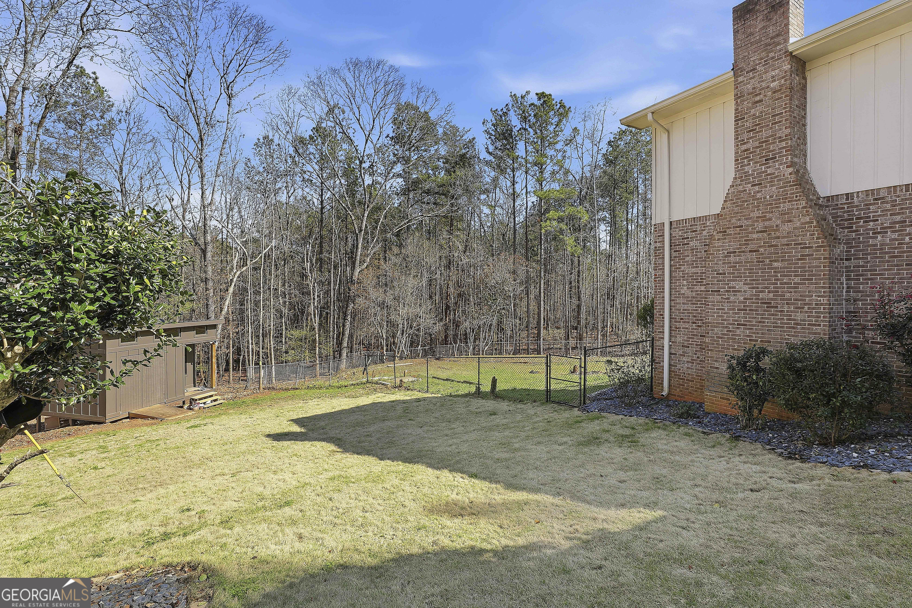 180 Lockwood Road Fayetteville, GA 30215 - Photo 45 of 59 a view of a basketball area in the backyard
