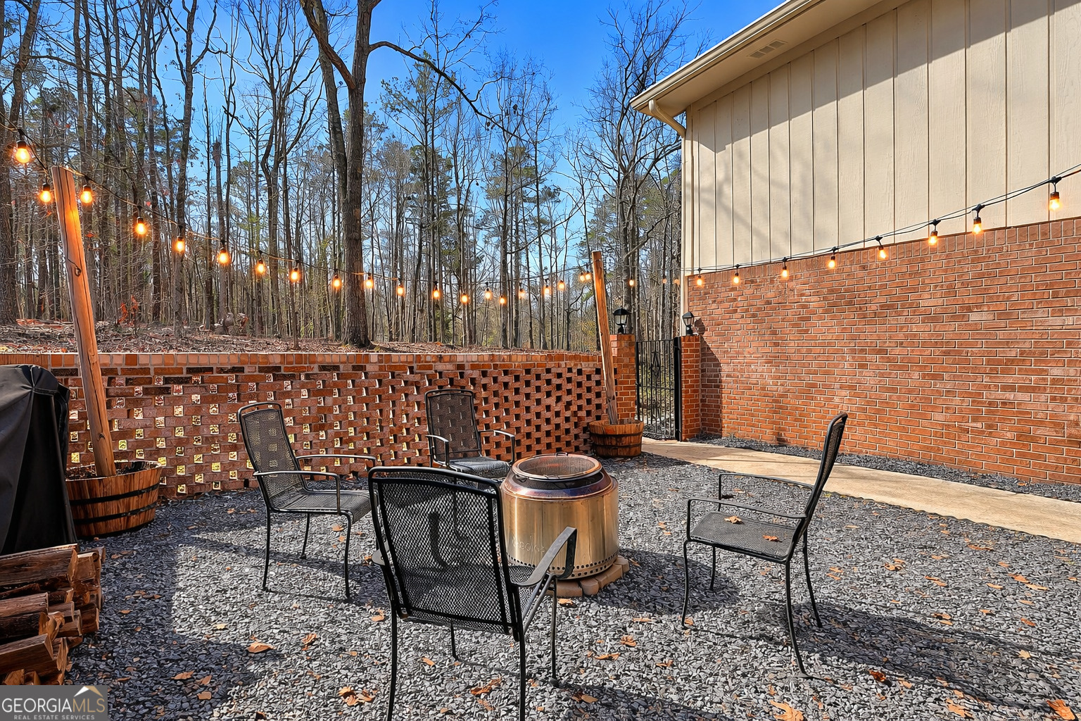 180 Lockwood Road Fayetteville, GA 30215 - Photo 8 of 59 a view of a chairs and table in backyard