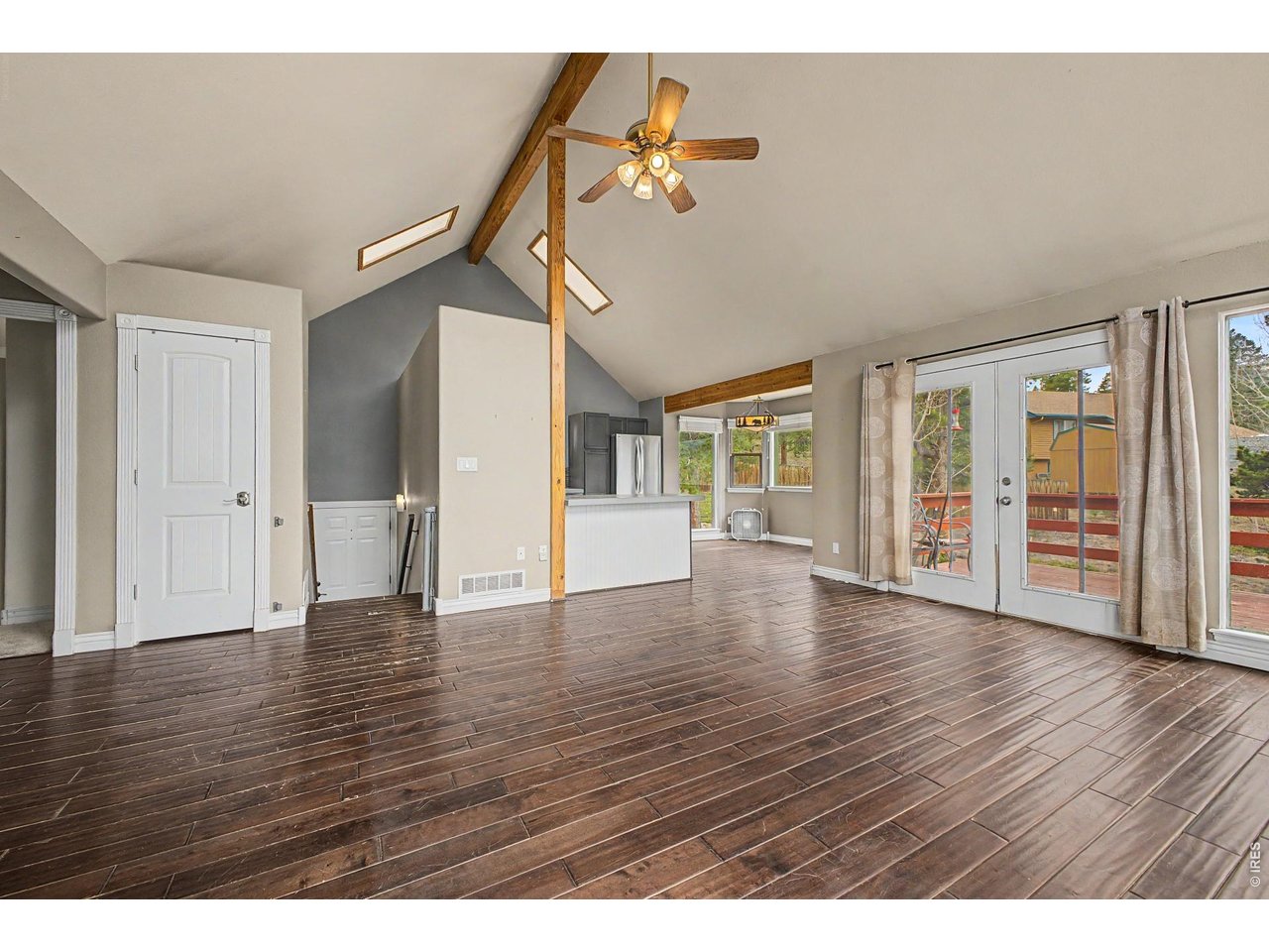 76 Highlands Drive Bailey, CO 80421 - Photo 9 of 49 a view interior of a house wooden floor and windows