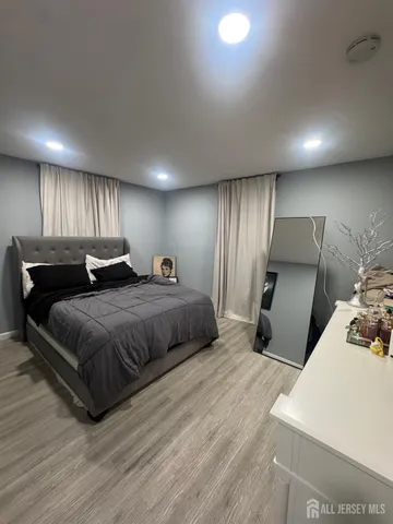 a room with lots of chairs and flower pot