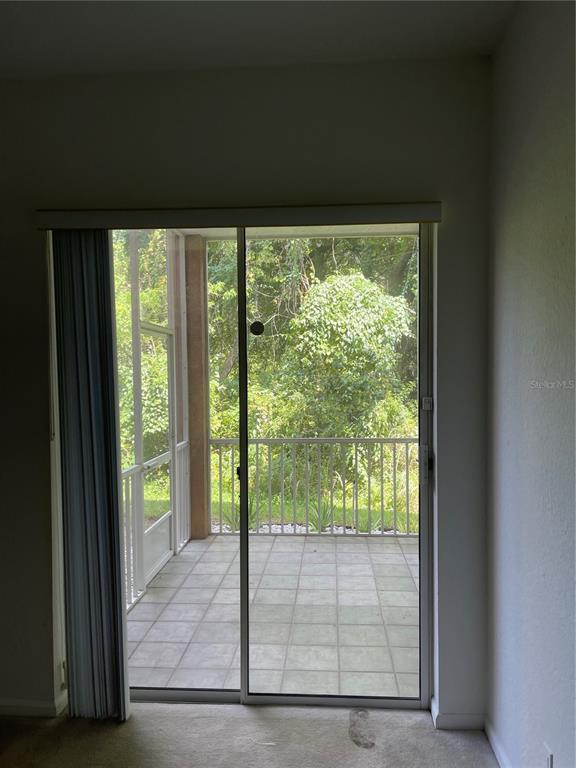 7617 Bayport Road, Unit 57 Orlando, FL 32819 - Photo 17 of 39 a view of entryway