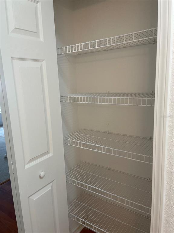 7617 Bayport Road, Unit 57 Orlando, FL 32819 - Photo 24 of 39 a bathroom with a glass shower door