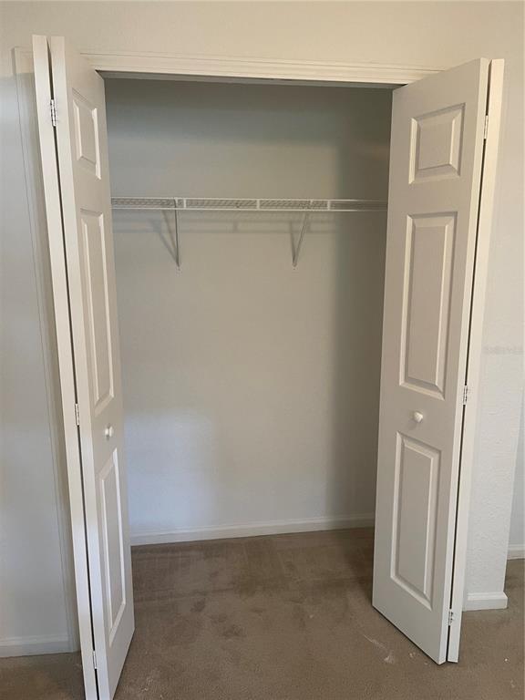 7617 Bayport Road, Unit 57 Orlando, FL 32819 - Photo 26 of 39 a view of closet area