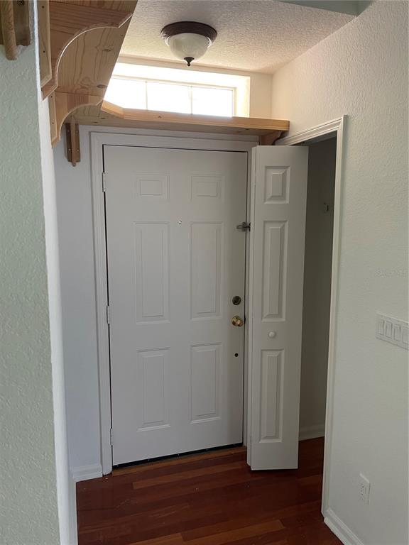 7617 Bayport Road, Unit 57 Orlando, FL 32819 - Photo 5 of 39 a view of front door