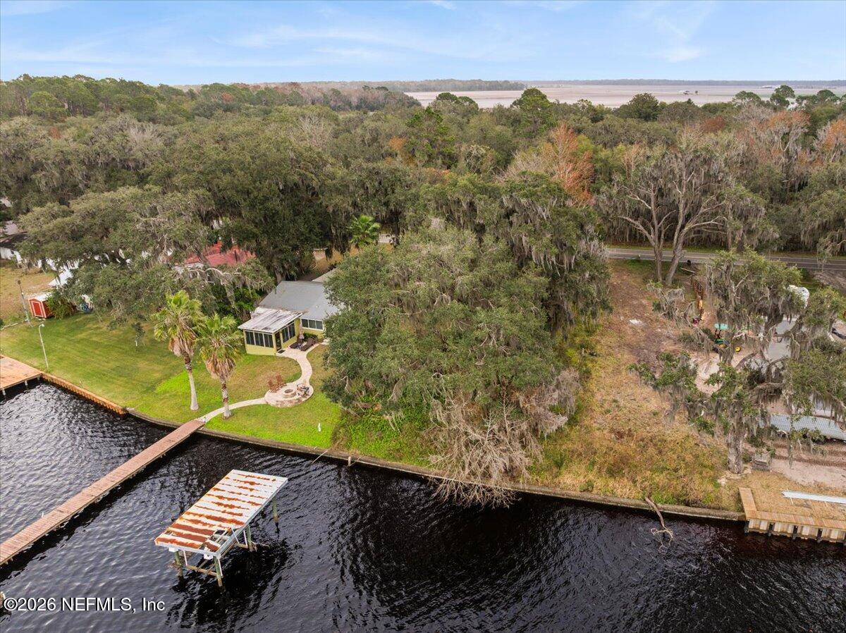 13607 County Road 13 North St. Augustine, FL 32092 - Photo 4 of 11 a view of a lake with a mountain in the background
