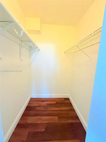 a view of small space with wooden floor