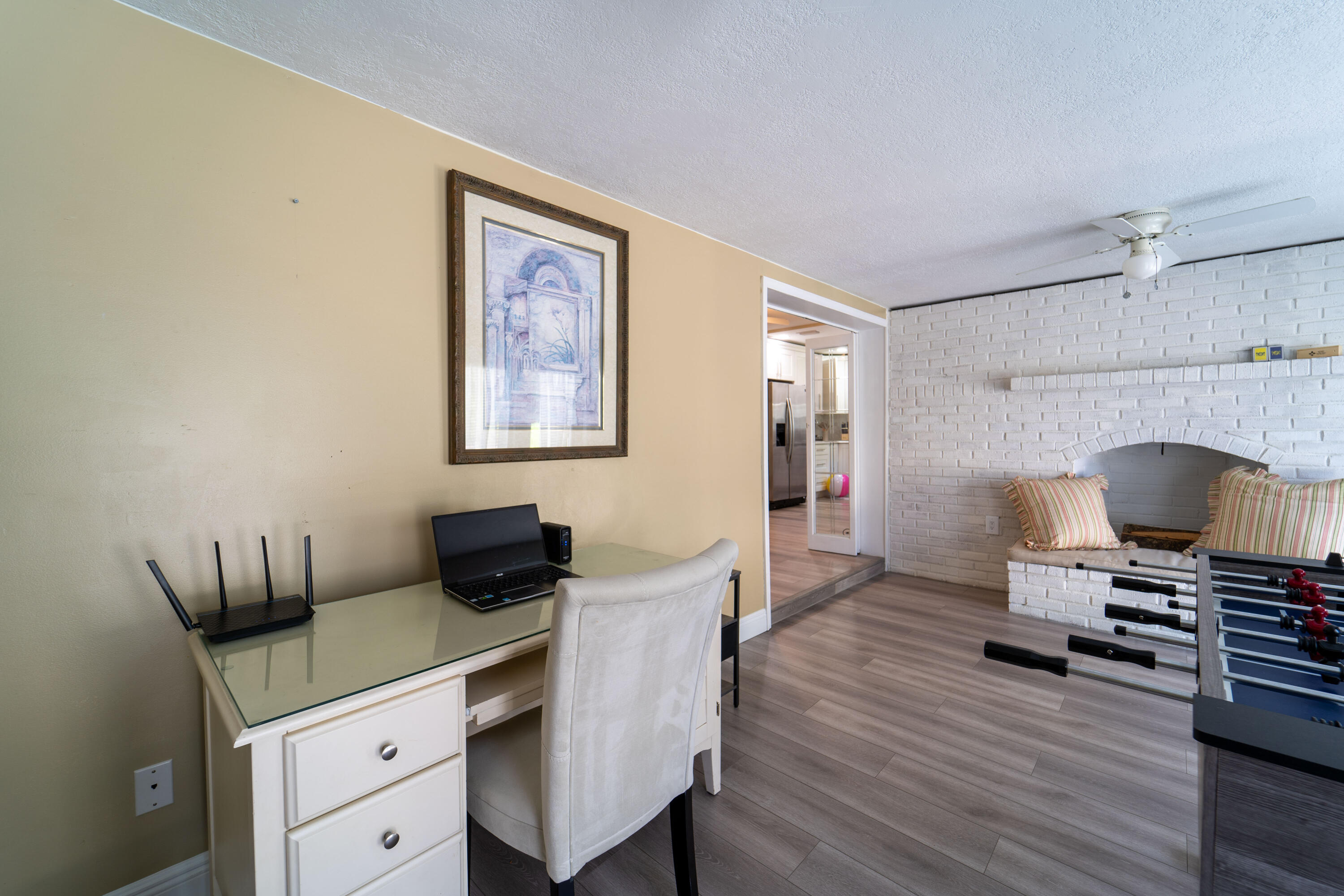 Undisclosed Address Lake Worth, FL 33461 - Photo 11 of 33 a living room with furniture and a fireplace