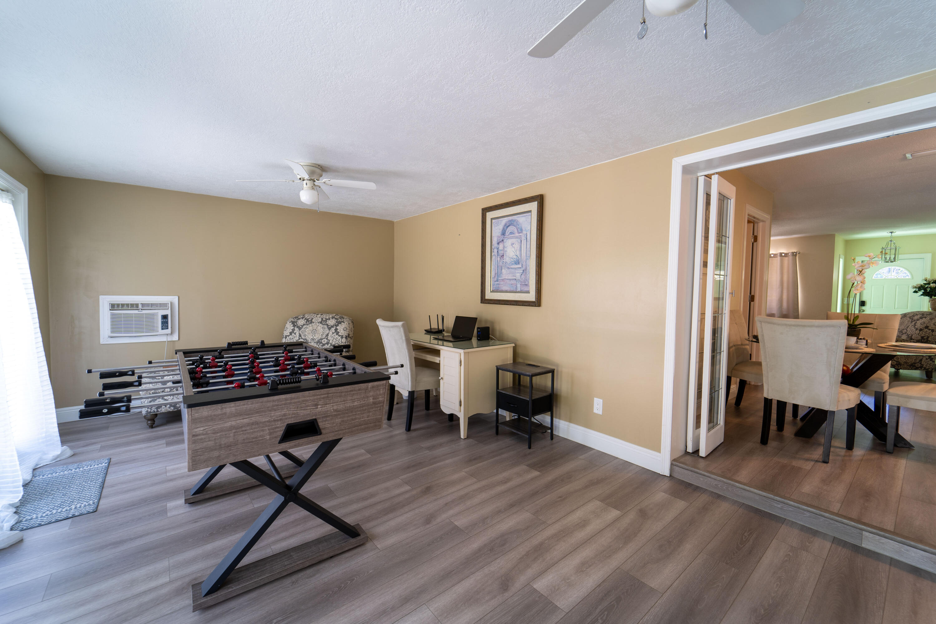 Undisclosed Address Lake Worth, FL 33461 - Photo 12 of 33 a living room with furniture and a wooden floor