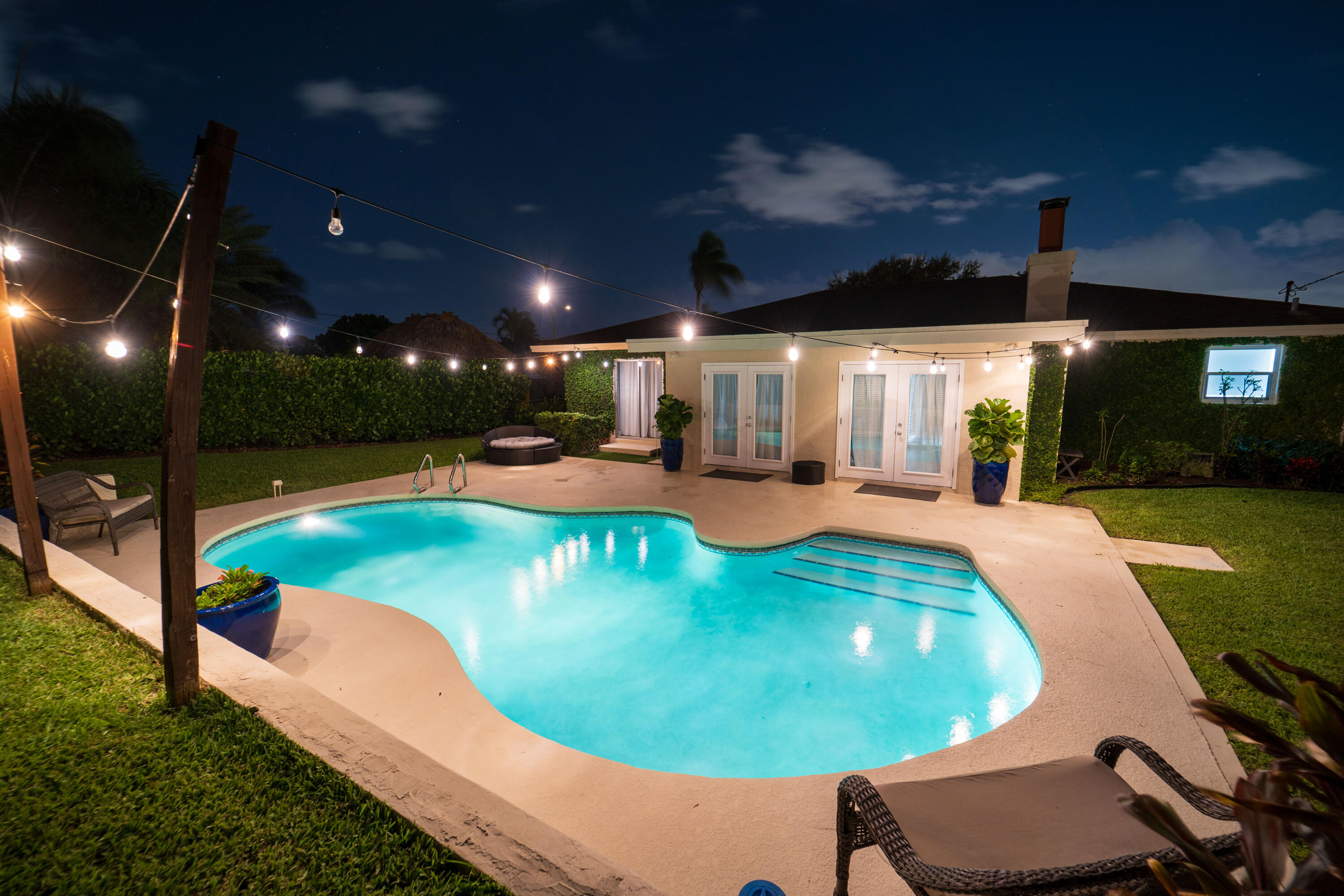 Undisclosed Address Lake Worth, FL 33461 - Photo 29 of 33 an outdoor space with swimming pool and furniture