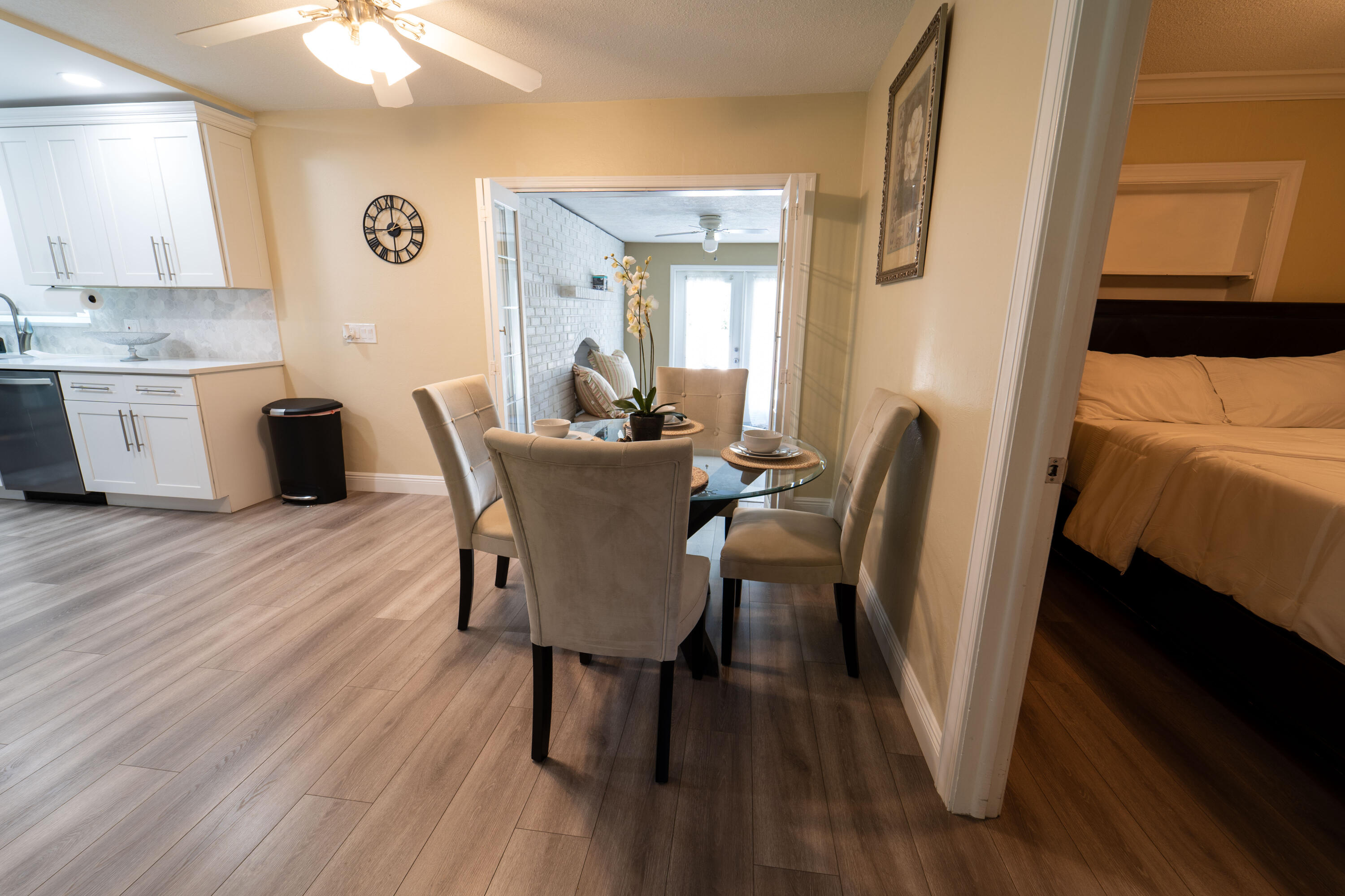 Undisclosed Address Lake Worth, FL 33461 - Photo 10 of 33 a view of a dining room with furniture and wooden floor