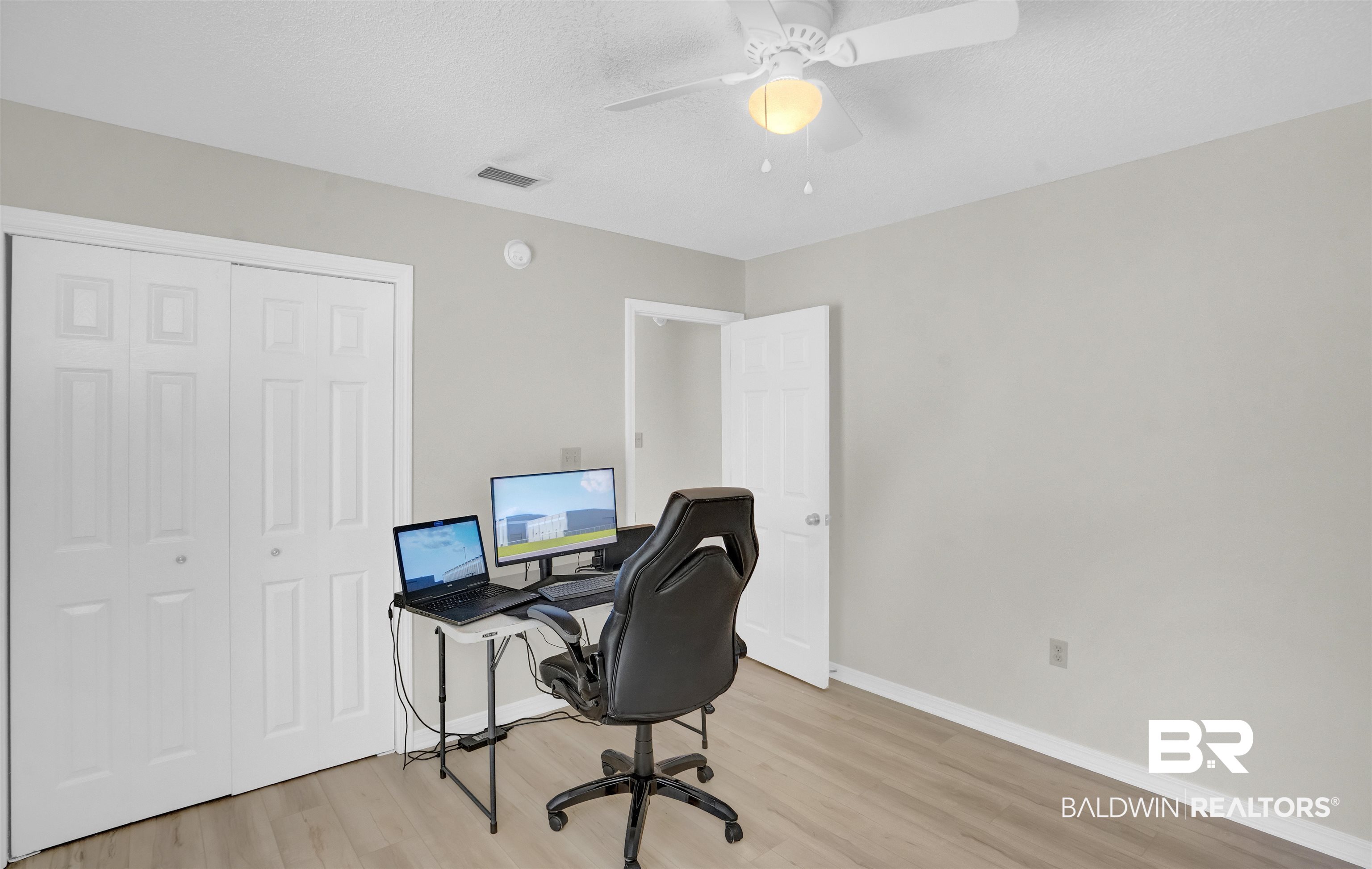 30871 Stanton Road Spanish Fort, AL 36527 - Photo 17 of 35 Home office featuring ceiling fan and light hardwood / wood-style floors