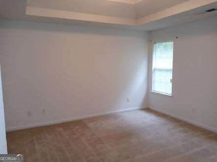 636 Rayella Drive Stockbridge, GA 30281 - Photo 6 of 13 a room that has a window in it