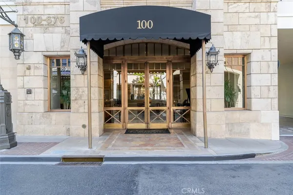 a front view of a building with a porch