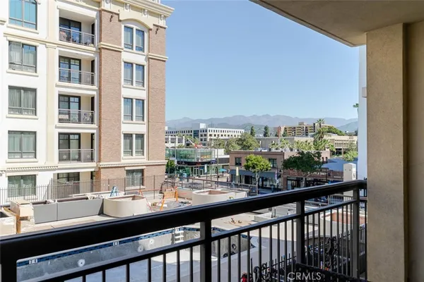 a view of a street from a balcony