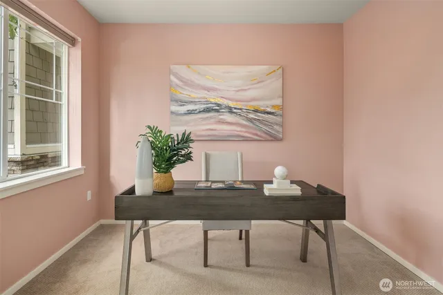 a workspace with furniture and window