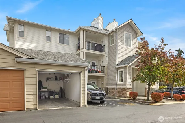 a view of a car park in front of house