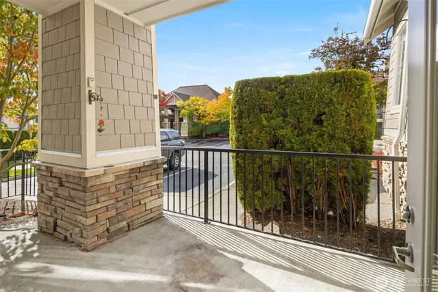 a view of a balcony with a potted plant