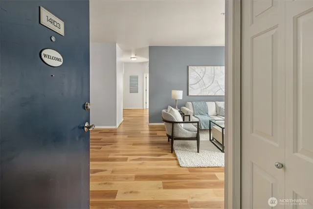 a view of living room with furniture and a window