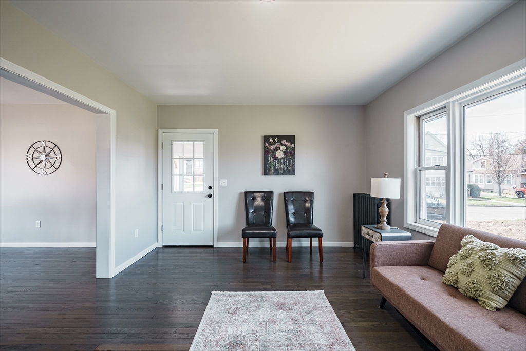 10 Bill Street Chicopee, MA 01013 - Photo 13 of 41 a living room with furniture and a table