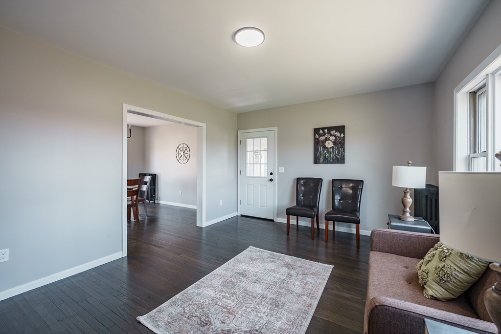 10 Bill Street Chicopee, MA 01013 - Photo 14 of 41 a living room with furniture and a table