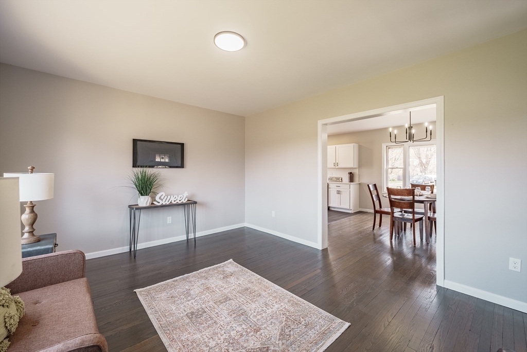 10 Bill Street Chicopee, MA 01013 - Photo 16 of 41 a living room with furniture and a table