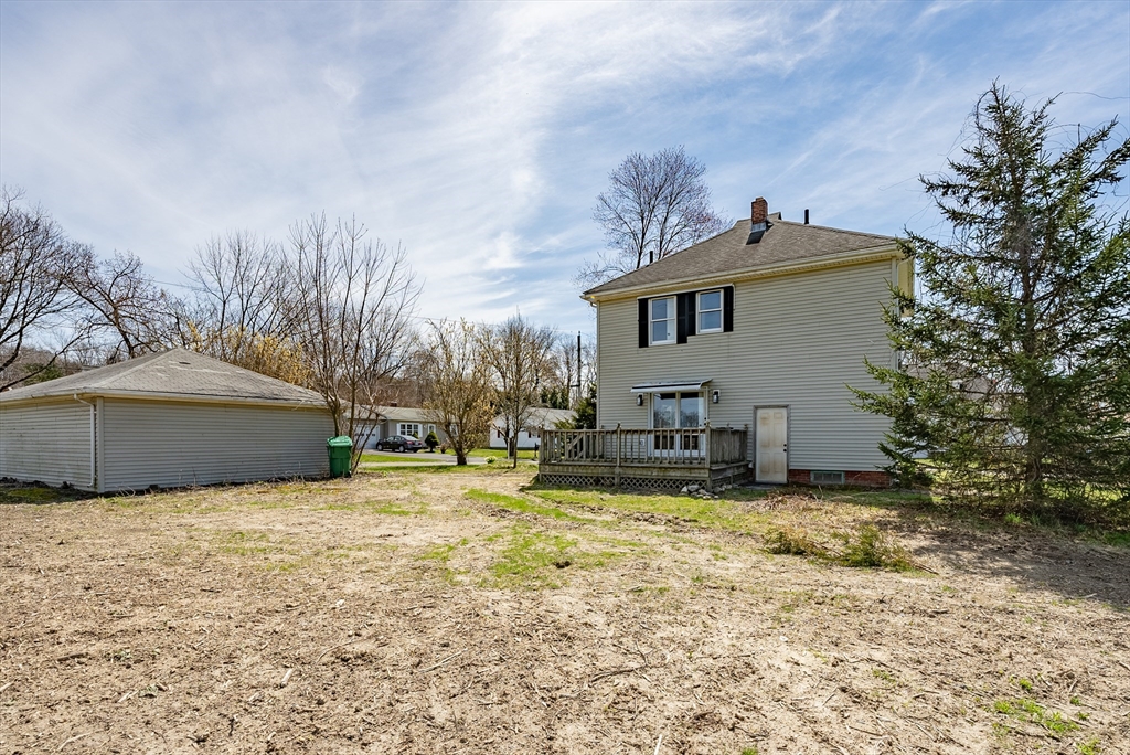 10 Bill Street Chicopee, MA 01013 - Photo 39 of 41 a view of a house with a yard and sitting area