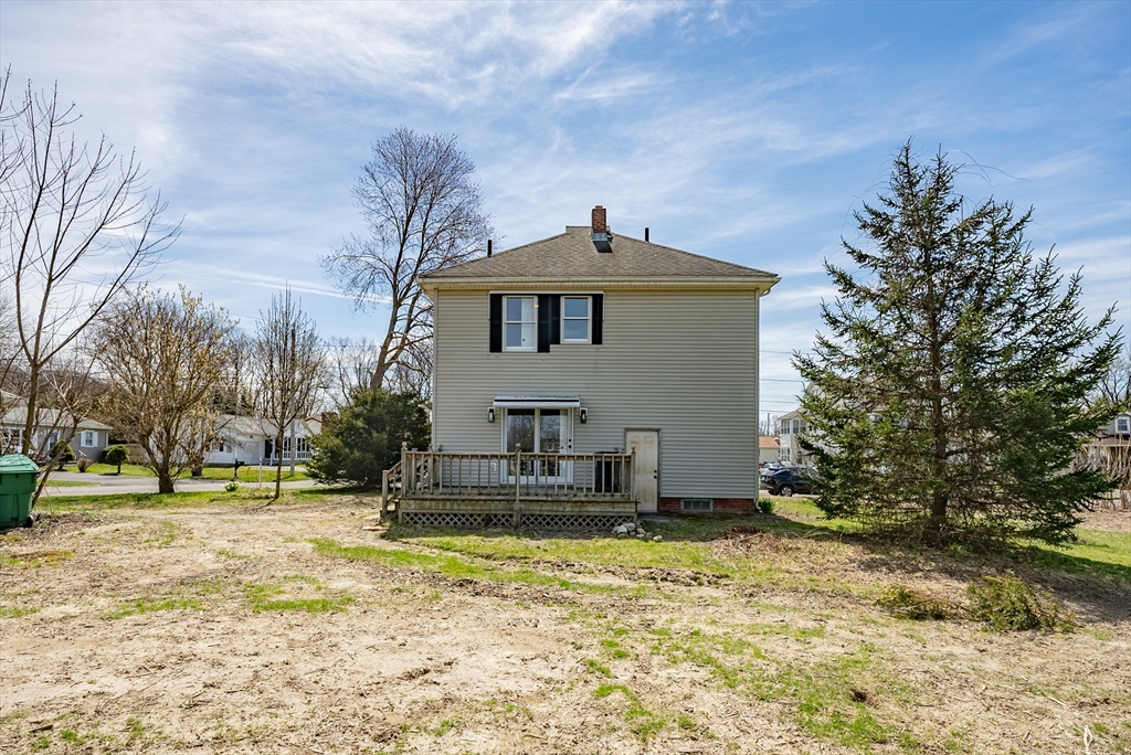 10 Bill Street Chicopee, MA 01013 - Photo 40 of 41 a front view of a house with a yard