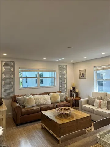 a living room with furniture and a table