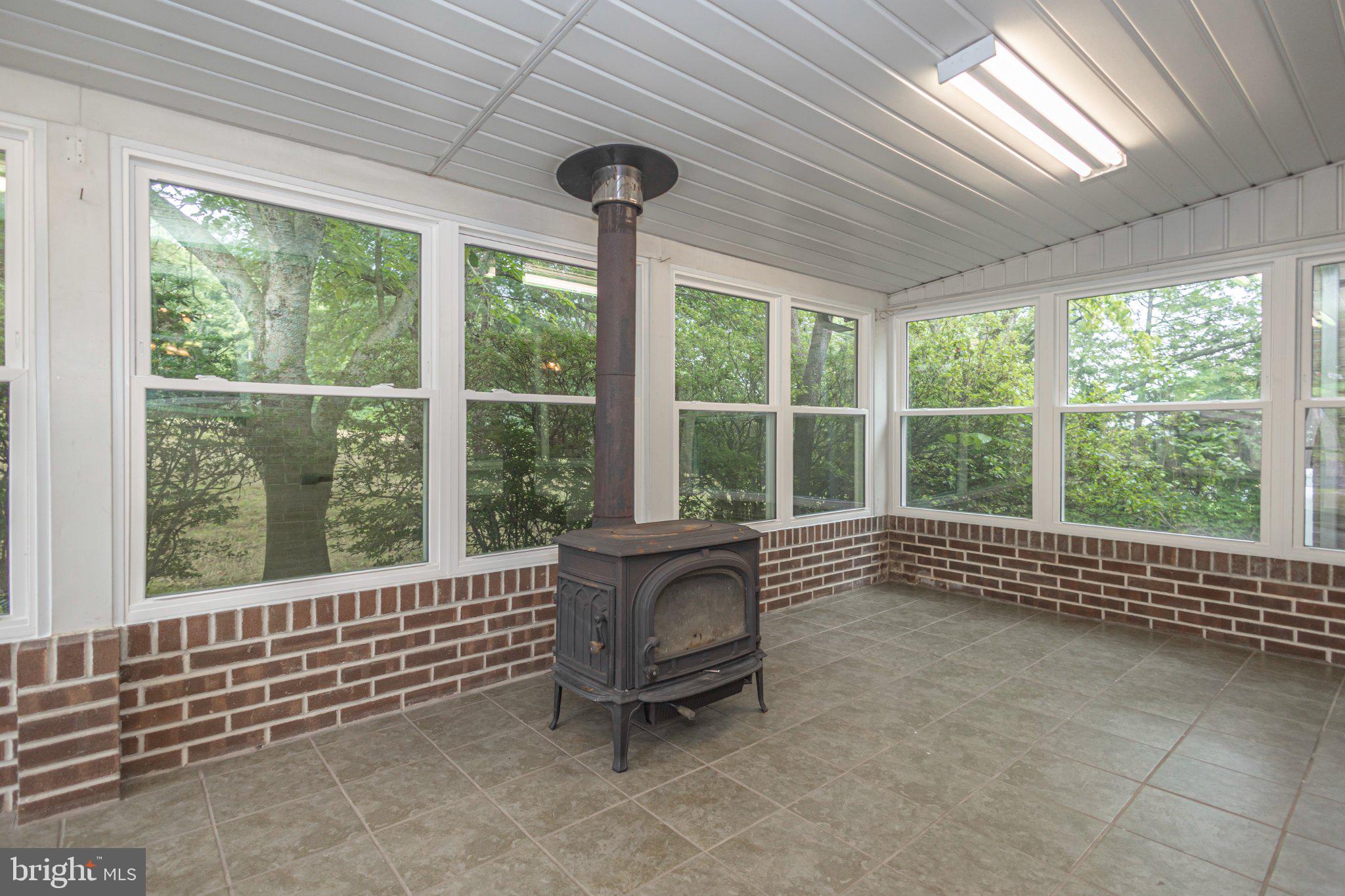 130 Webber Road Telford, PA 18969 - Photo 34 of 52 Cozy sunlit space with rustic charm.