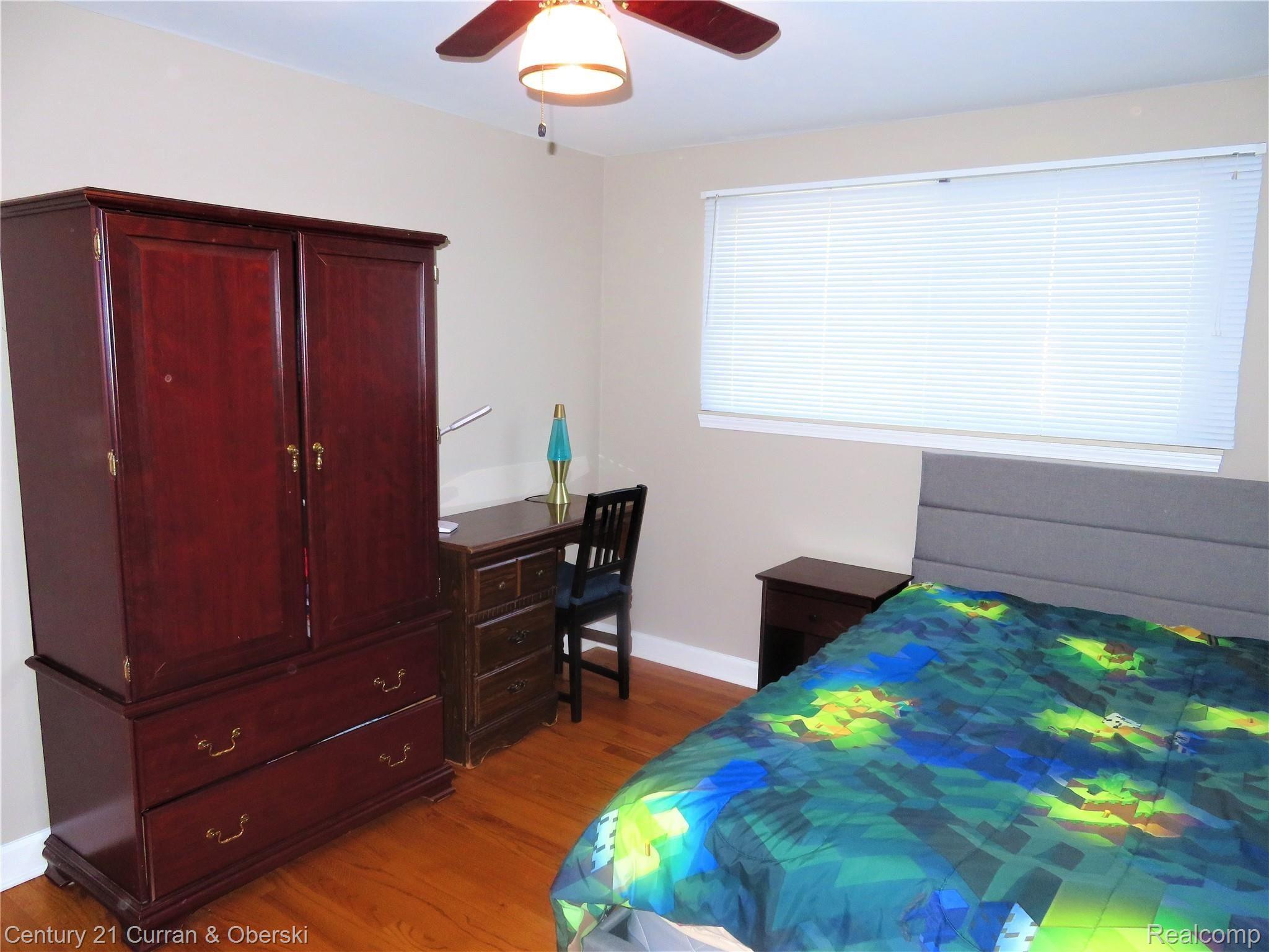 7770 Provincial Road Canton, MI 48187 - Photo 17 of 26 Bedroom #3 with ceiling fan and hardwood floor
