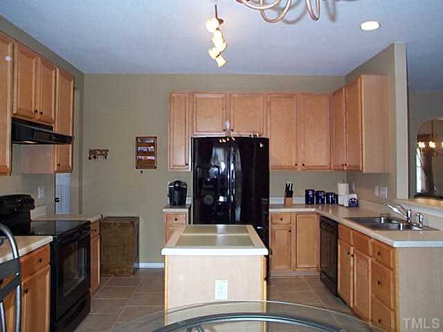 5331 Seaspray Lane Raleigh, NC 27610 - Photo 4 of 12 Lots of cabinets and counter space