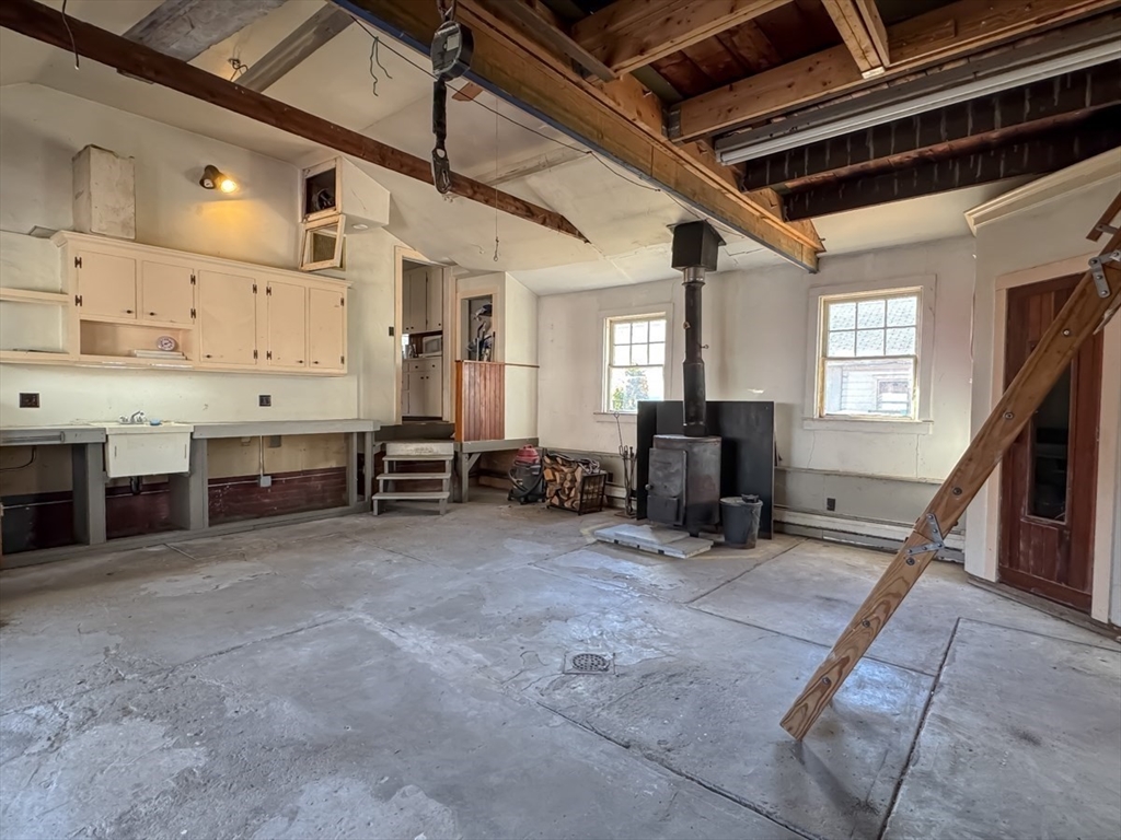 83 Newton Street Greenfield, MA 01301 - Photo 37 of 42 a view of kitchen with furniture and windows