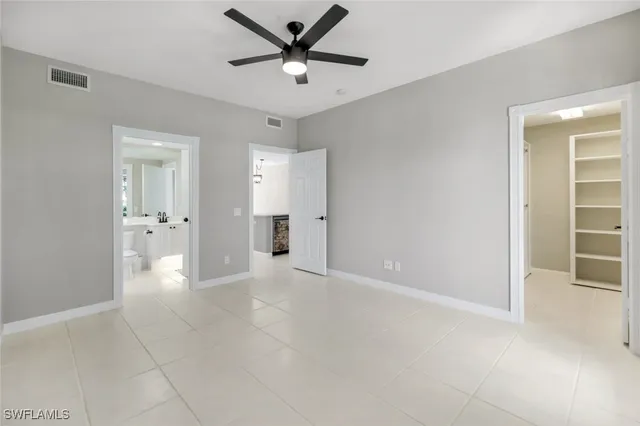 a view of an empty room and fire place