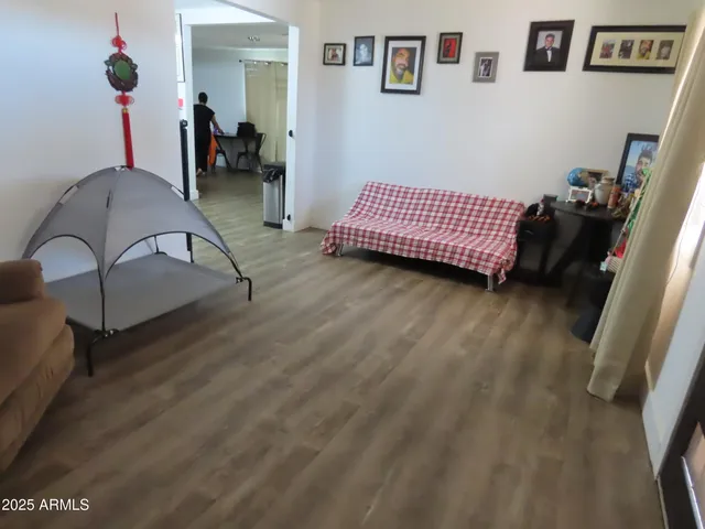a room with furniture and air hockey table