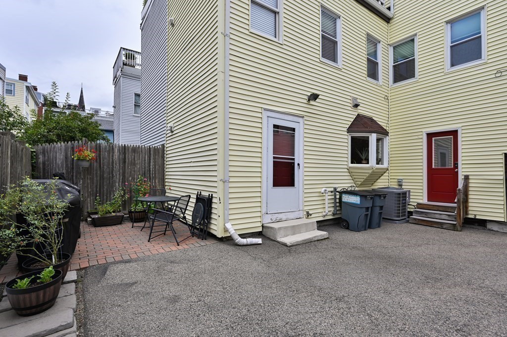 8 Sheafe Street, Unit 1 Boston, MA 02129 - Photo 18 of 19 a view of a house with backyard and sitting area