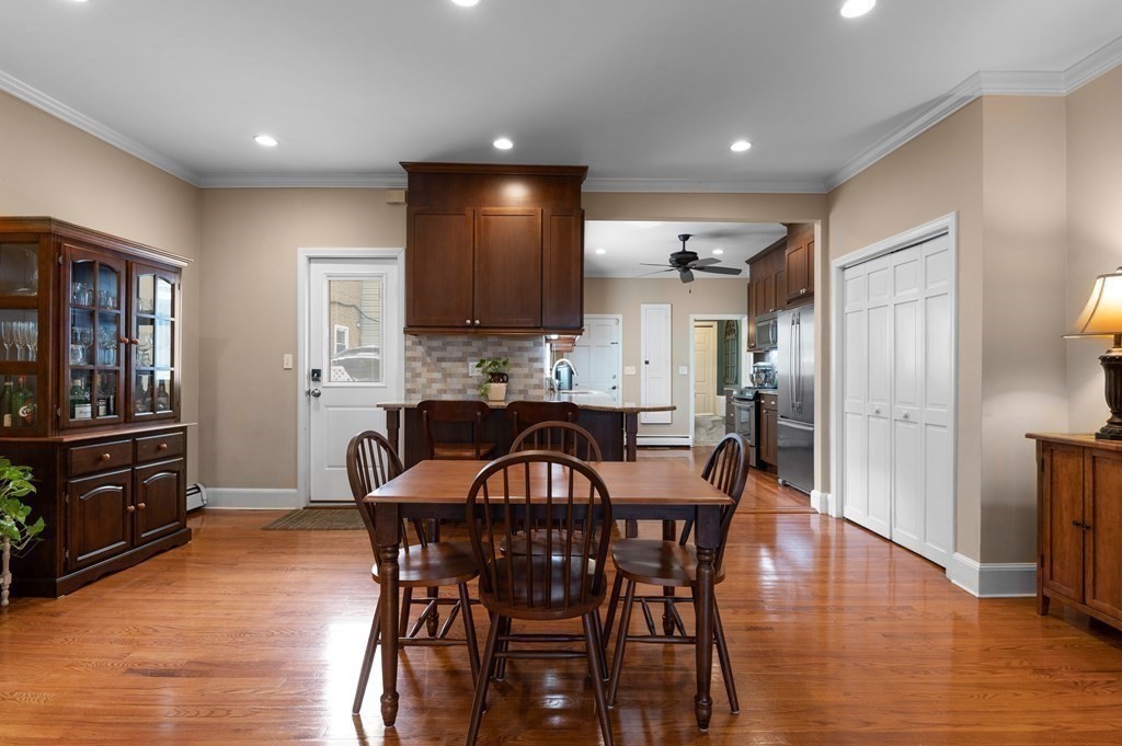 8 Sheafe Street, Unit 1 Boston, MA 02129 - Photo 5 of 19 a view of a dining room with furniture and wooden floor