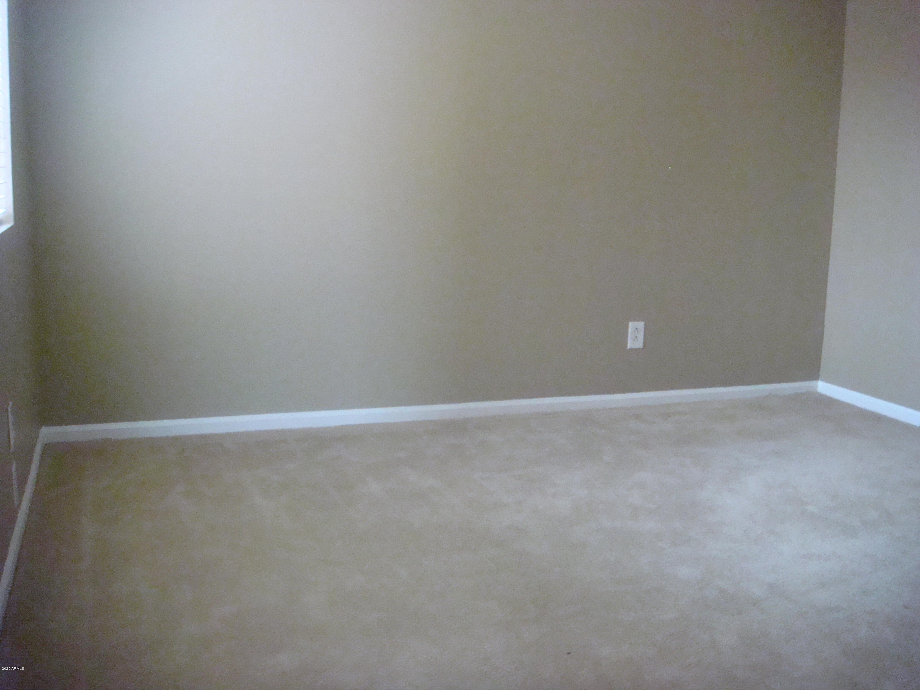 5640 East Bell Road, Unit 1022 Scottsdale, AZ 85254 - Photo 15 of 27 a view of an empty room