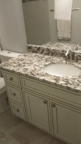 a bathroom with a shower and a bathtub