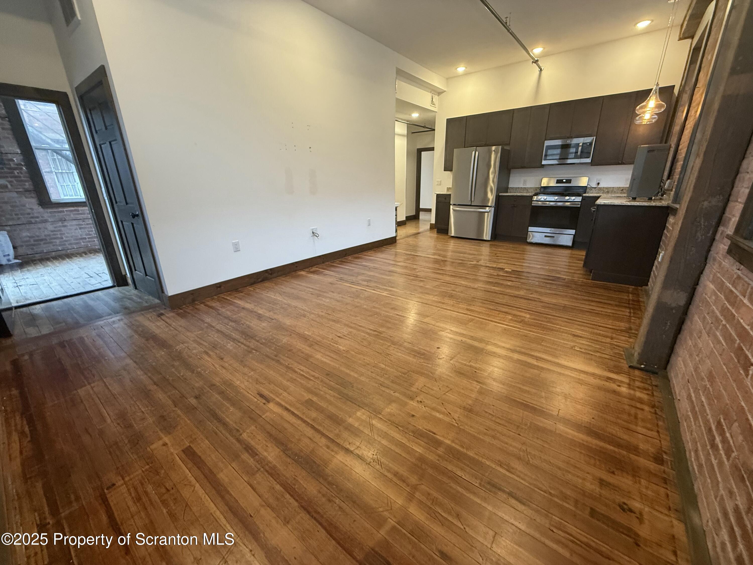 103 Park Street, Unit 1A Honesdale, PA 18431 - Photo 2 of 15 a view of a kitchen with a sink
