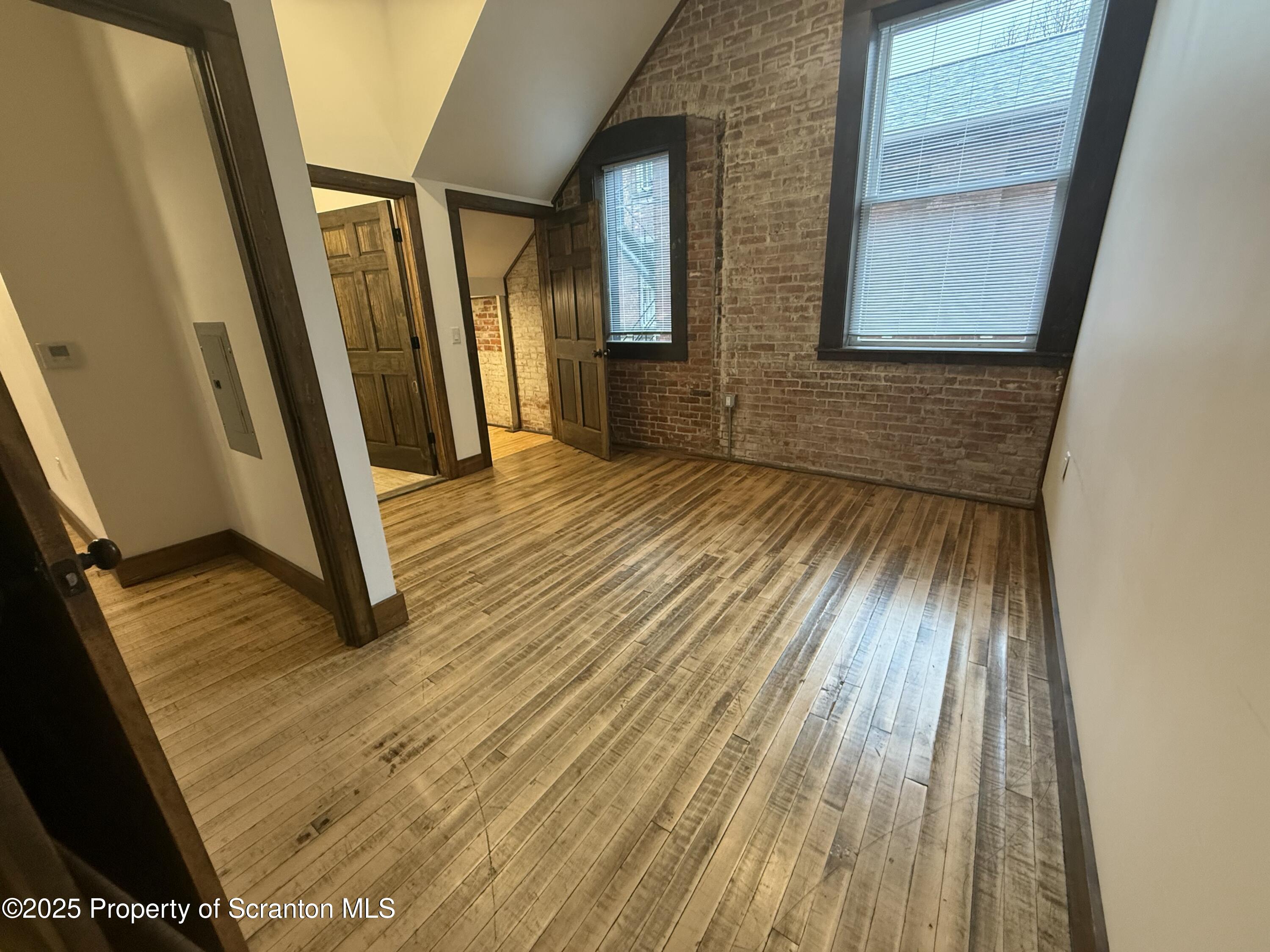 103 Park Street, Unit 1A Honesdale, PA 18431 - Photo 8 of 15 a view of front door with wooden floor
