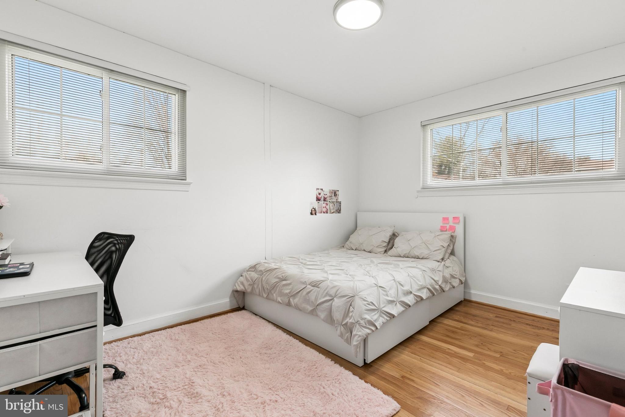 12829 Baker Drive Silver Spring, MD 20904 - Photo 29 of 59 a bedroom with a bed and a desk