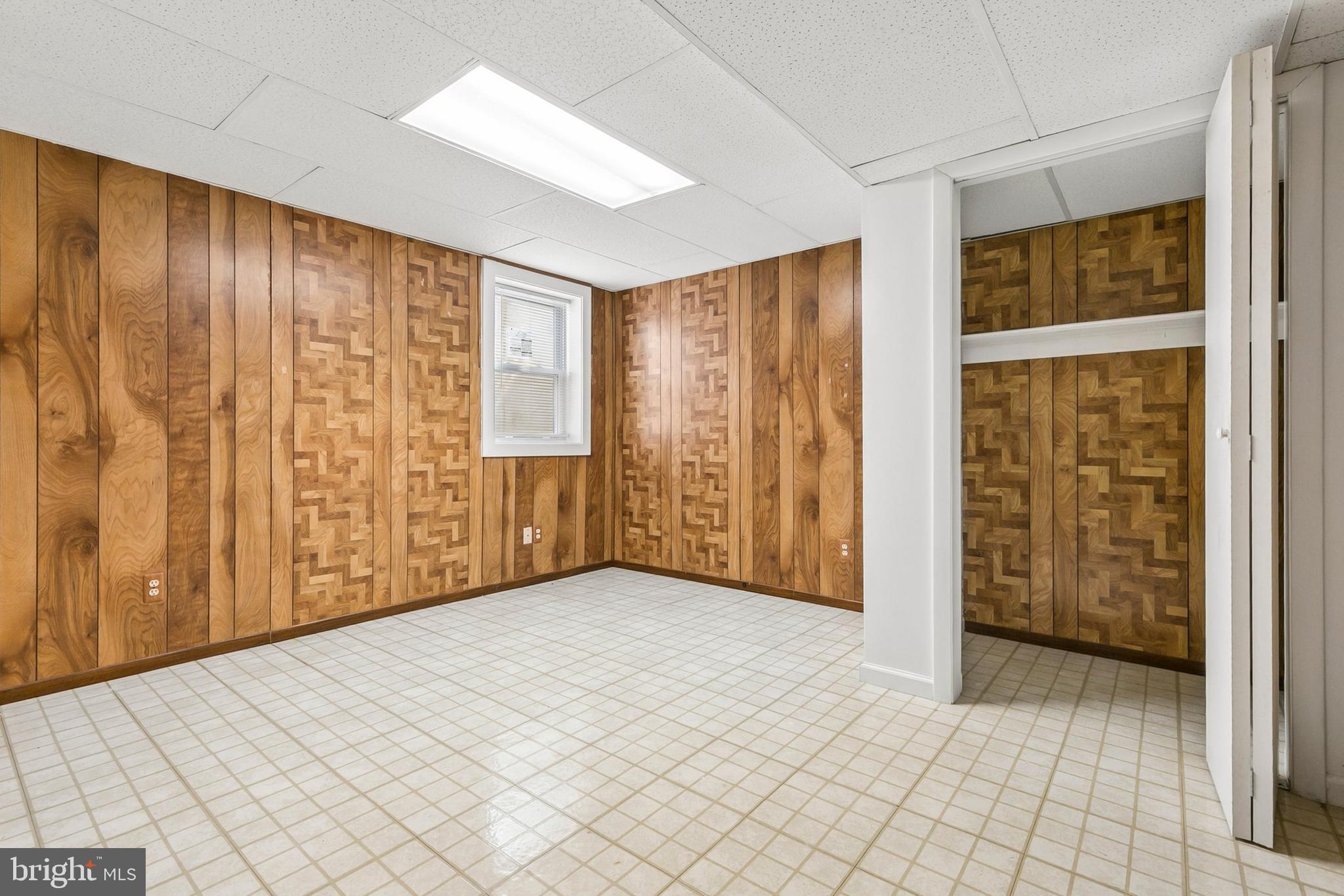 12829 Baker Drive Silver Spring, MD 20904 - Photo 44 of 59 an empty room with windows