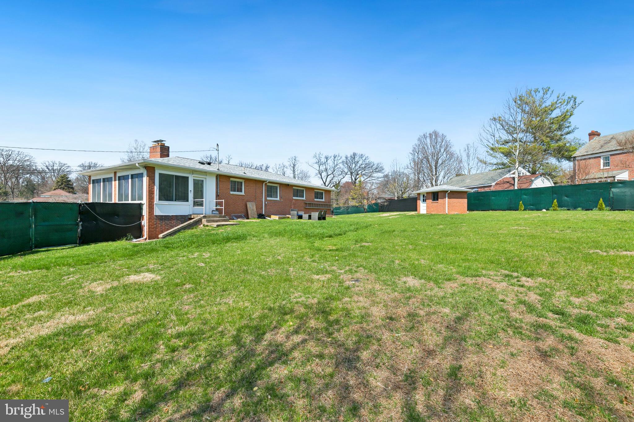 12829 Baker Drive Silver Spring, MD 20904 - Photo 49 of 59 a view of a house with a yard and sitting area