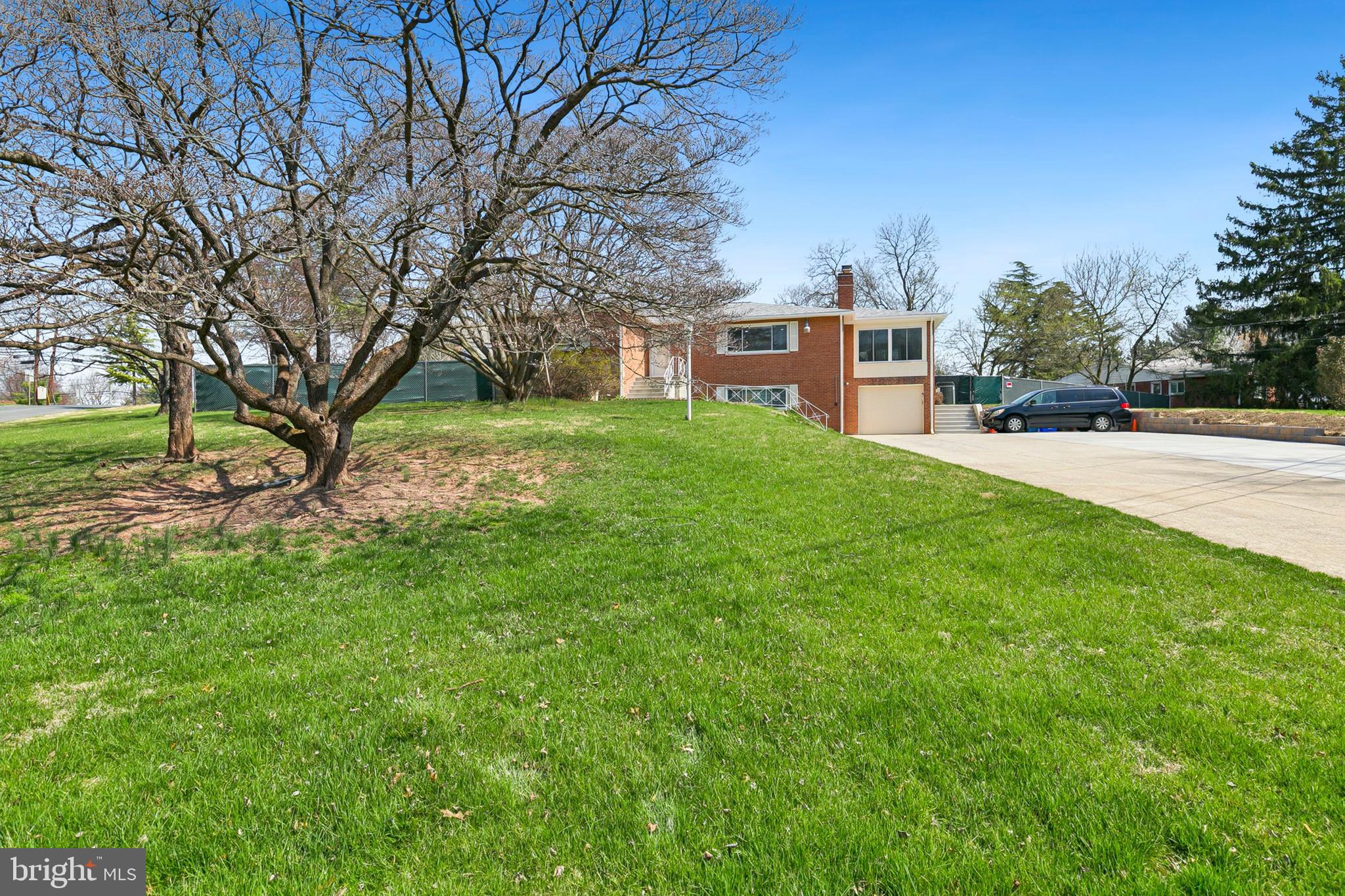 12829 Baker Drive Silver Spring, MD 20904 - Photo 54 of 59 a view of a house with a yard