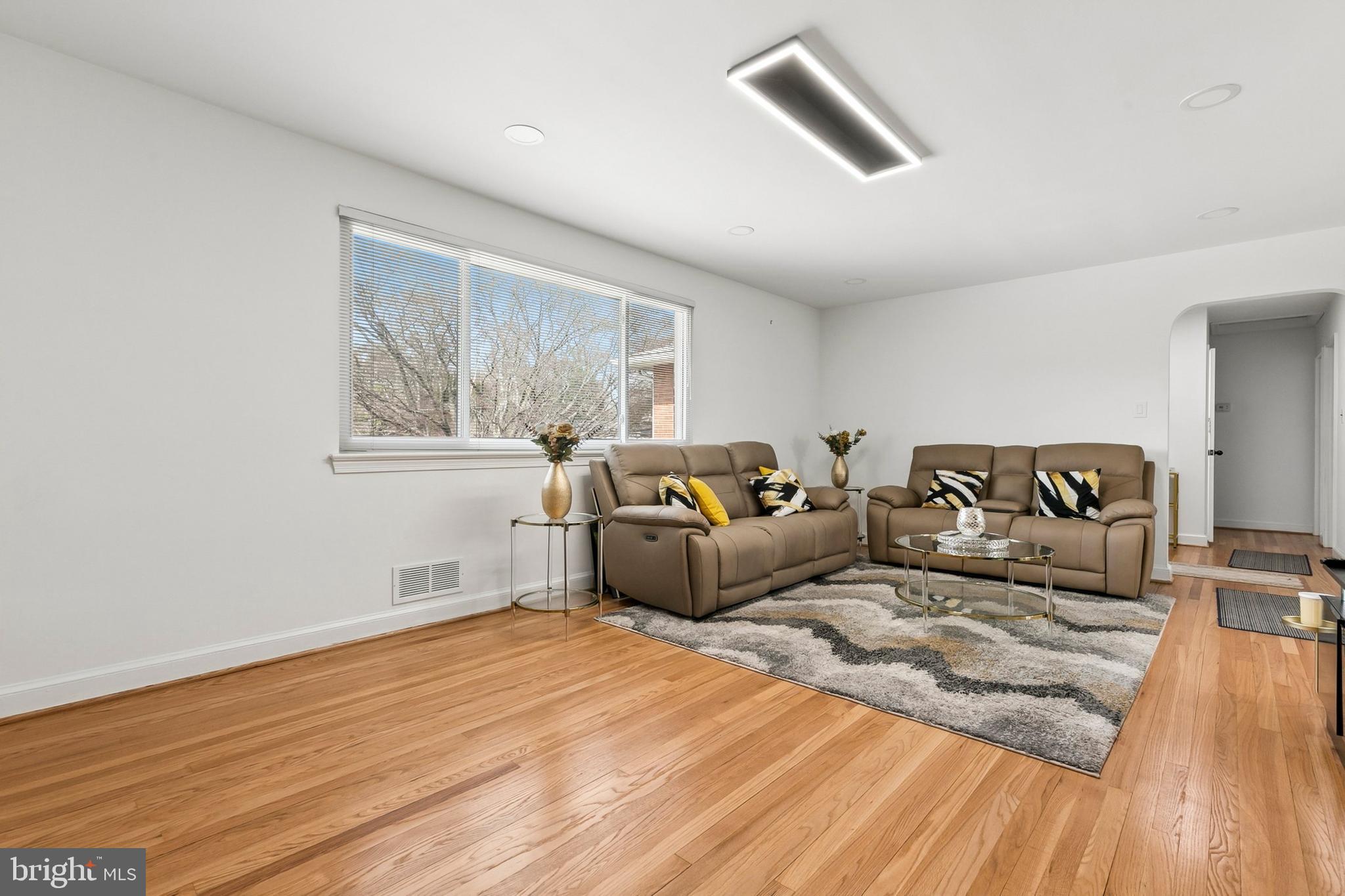 12829 Baker Drive Silver Spring, MD 20904 - Photo 10 of 59 a bedroom with furniture and wooden floor