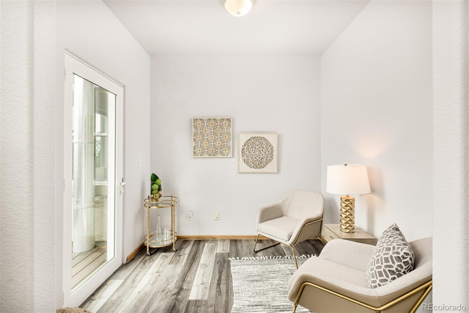 1453 Santa Fe Mountain Road Evergreen, CO 80439 - Photo 26 of 50 a living room with furniture and a window